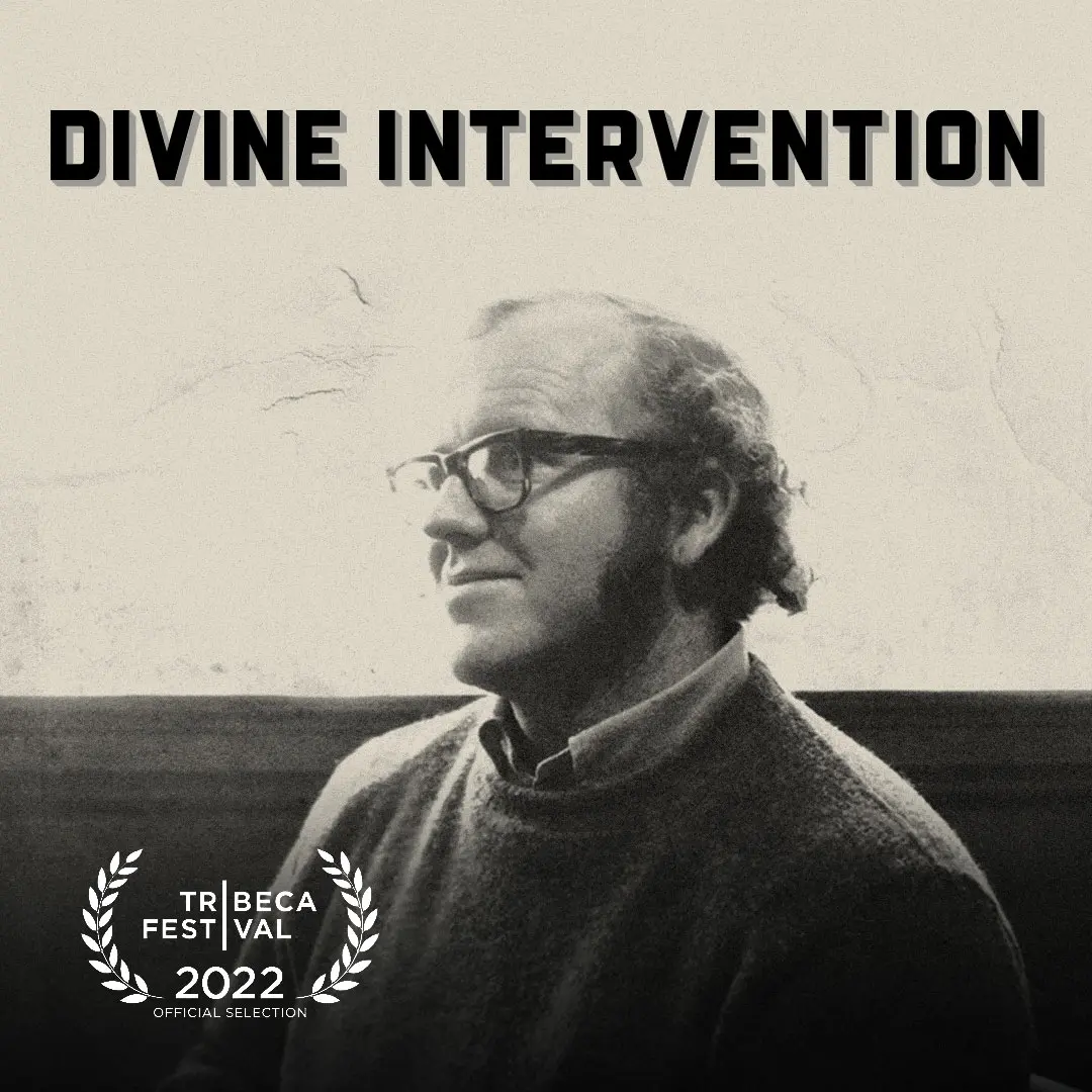 The cover art for "Divine Intervention," a podcast created by Brendan Hughes. It features a black-and-white photograph of a man with glasses, short curly hair, and sideburns, wearing a sweater over a collared shirt. The title "Divine Intervention" is prominently displayed at the top in bold, black letters. In the bottom left corner, there is a laurel wreath emblem indicating that the project is an official selection of the Tribeca Festival 2022.